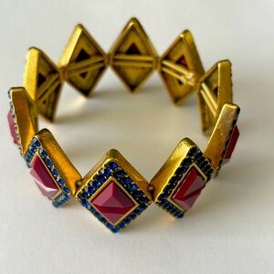 J.Crew rhinestone bracelet
Beautiful burgundy/red stones with blue rhinestones.